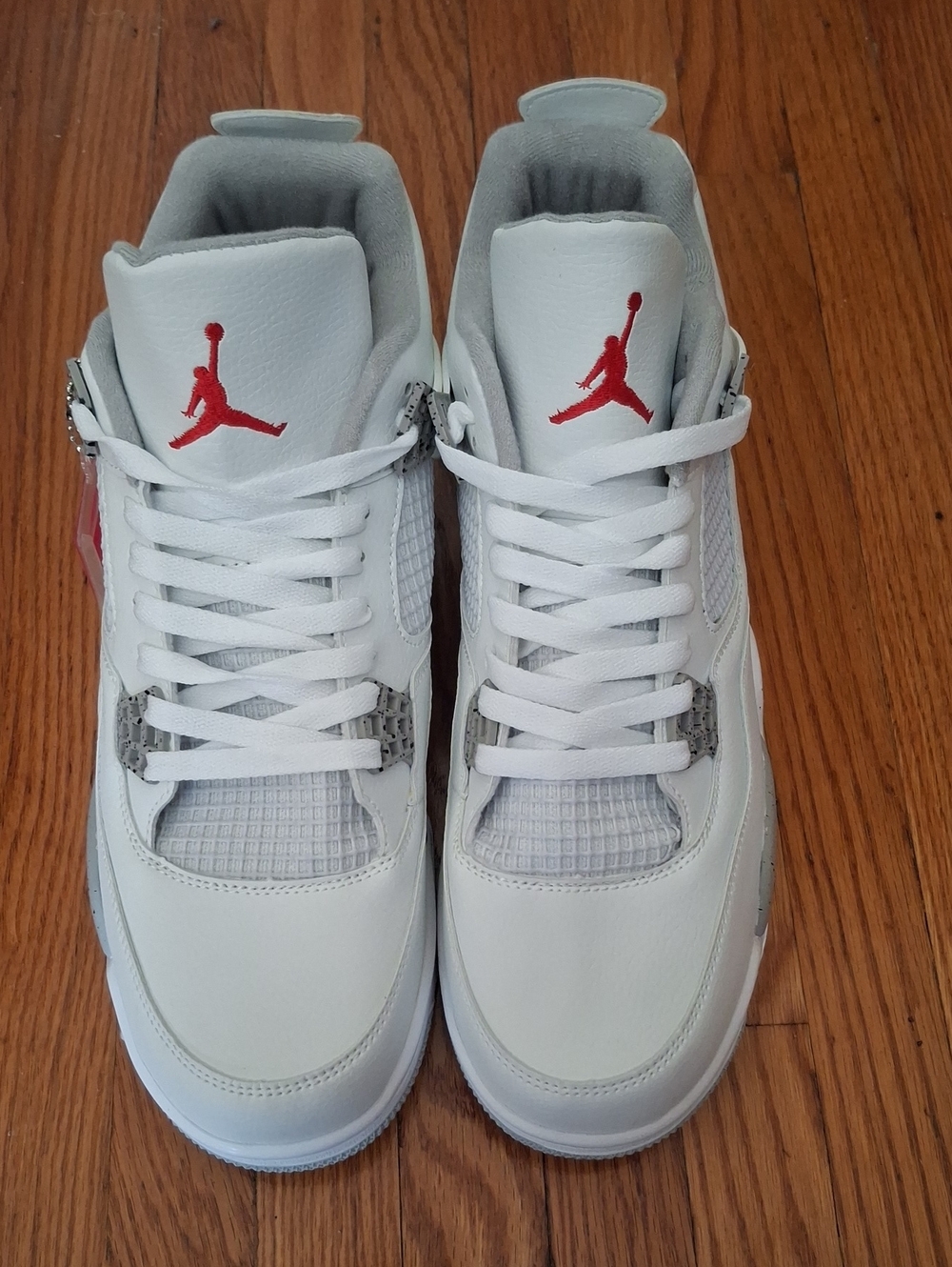 Never Been Worn Nike Air Jordan 4 White with Red Jumpman